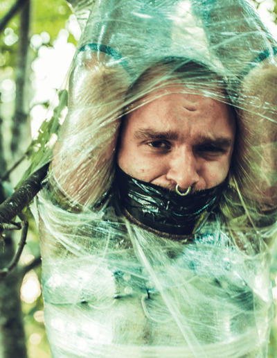 Drummer Mag Photo Of Man Restrained In Saran Wrap