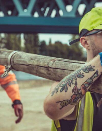 Drummer Mac Pic Bearded Workers Carrying Pole