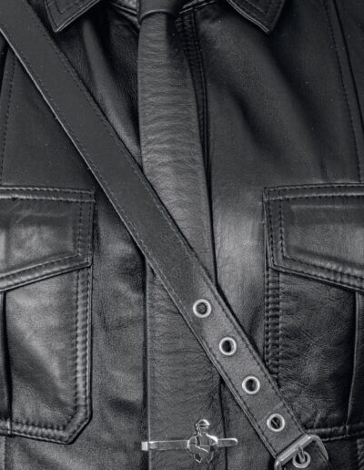 Drummer Mag Closeup Pic Of Black Leather Tie