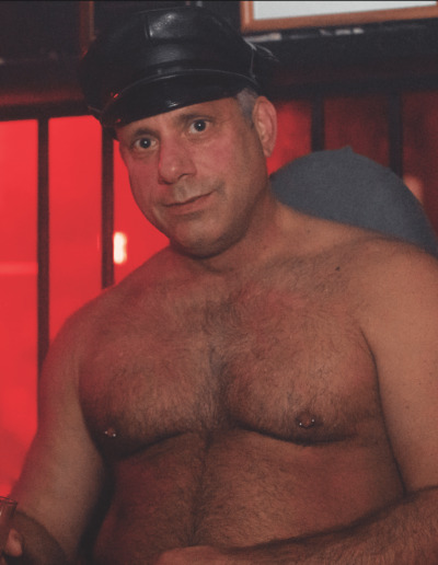 Drummer Mag Man With Pierced Nipples And Leather Cap