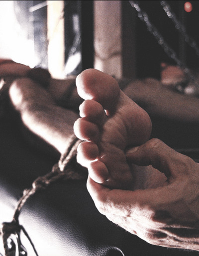 Drummer Mag Bondage Photo of Mans Foot Being Tortured
