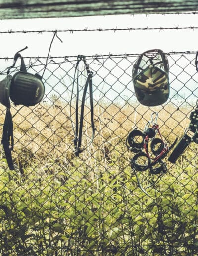 Fence With Kinky Fireman Fetish Gear